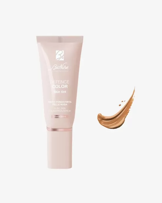 DEFENCE COLOR SKIN TINT fond de ten uniformizant fluid 704 CARAMEL tub 30 ml